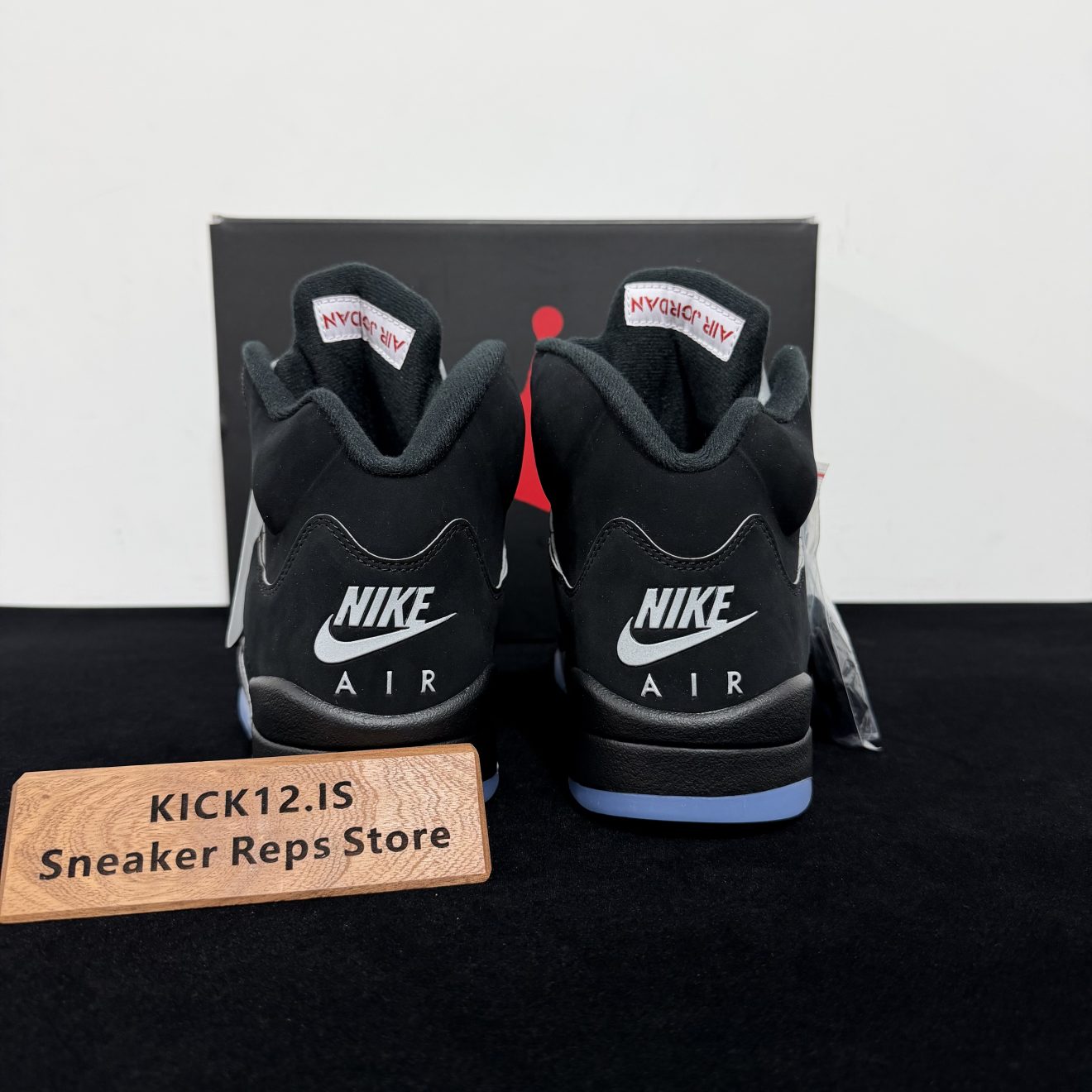 Back heel view of Jordan 5 Black Metallic Reimagined Reps