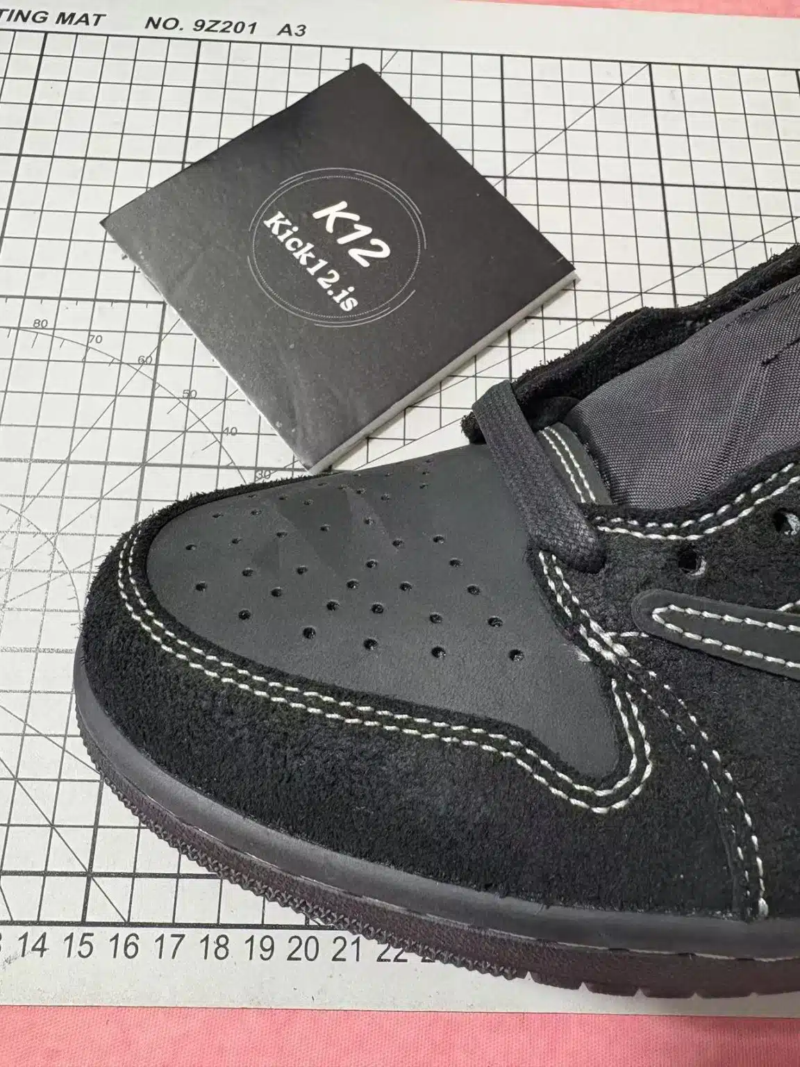 Close-up suede material on toe of Travis Scott Black Phantom reps