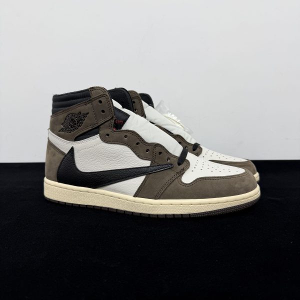 Side view of Travis Scott Jordan 1 High Mocha Reps with suede upper