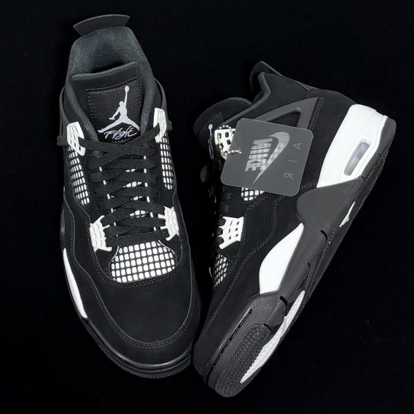 Top-down view of Jordan 4 White Thunder Reps