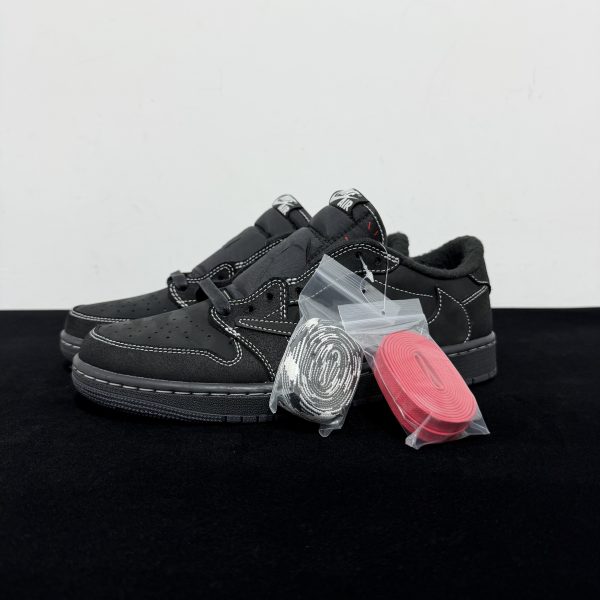 Side view of Travis Scott Black Phantom Reps with black nubuck upper