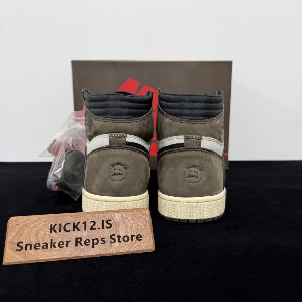 Back heel view of Travis Scott Jordan 1 High Mocha Reps