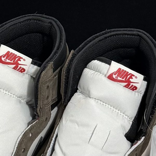 Close-up of tongue on Travis Scott Jordan 1 High Mocha Reps with Nike Air logo