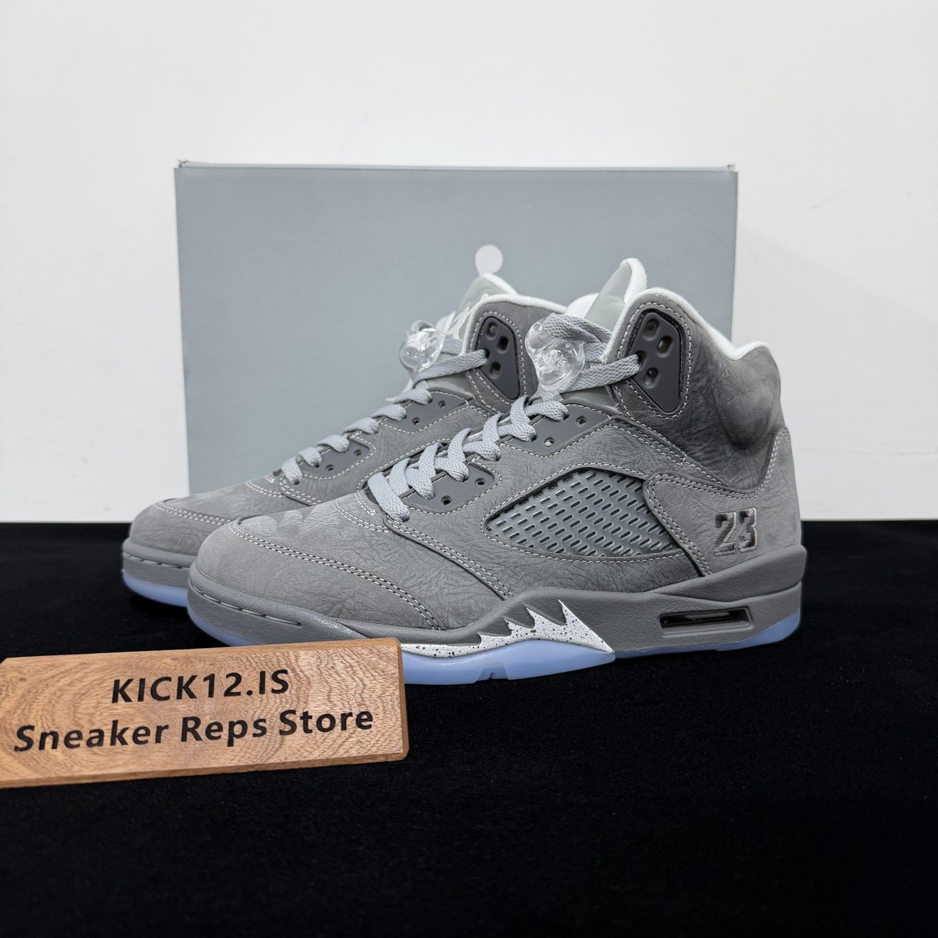 Air Jordan 5 Wolf Grey Reps with box displayed on table