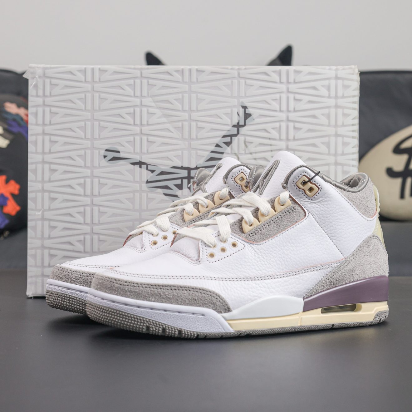 A Ma Maniere Jordan 3 reps with one shoe placed in front of shoebox