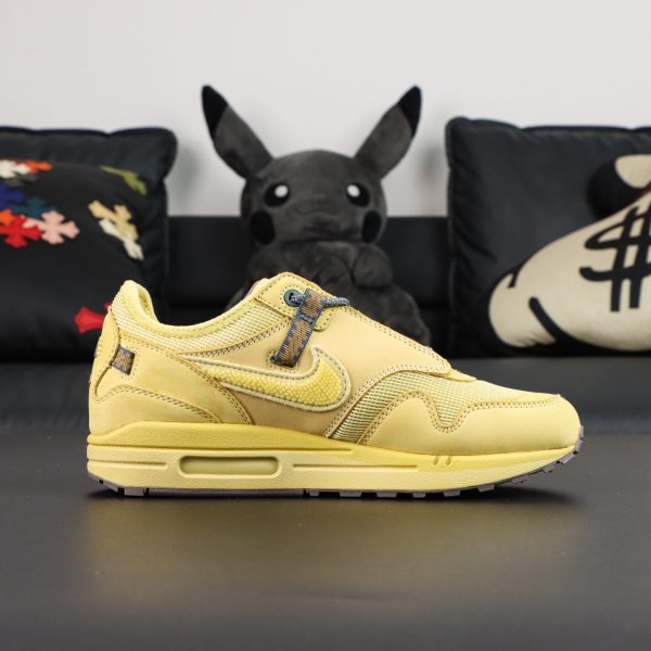 Inner side of Air Max 1 Saturn Gold Reps showing tonal mesh and rugged texture