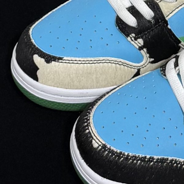Close-up of toebox on Dunk Chunky Dunky Reps showing cow print texture