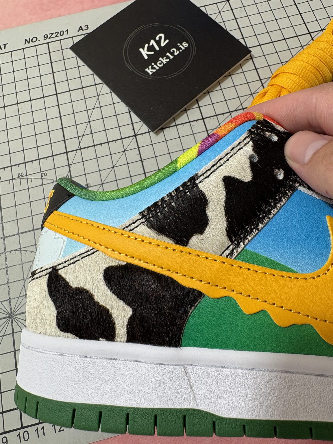 Close-up of faux cowhide and leather texture on Chunky Dunky replica sneakers