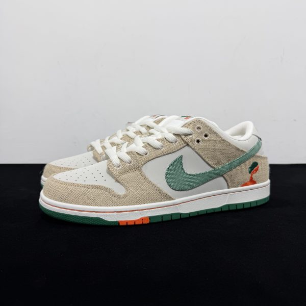 Side view of Jarritos Dunks Reps with canvas upper and green swoosh