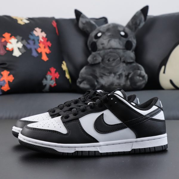 Side view of both Panda Dunk reps with iconic color blocking
