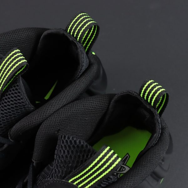 Tongue logo detail on Foamposite One Green Goblin Reps