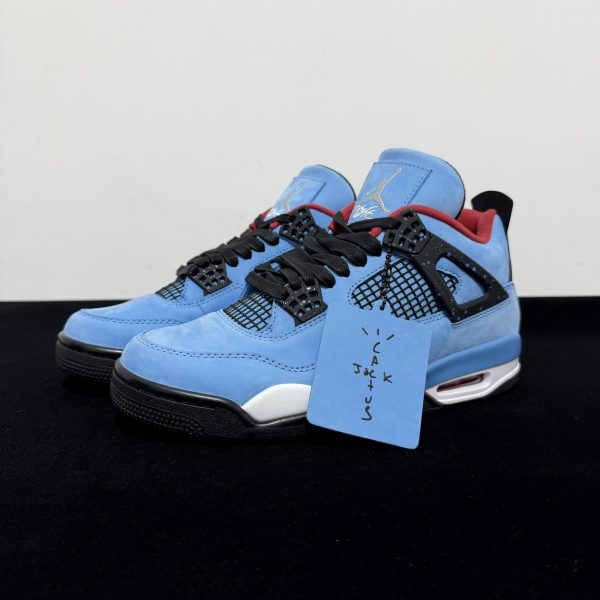 Side view of Jordan 4 Travis Scott Reps pair with Cactus Jack tag