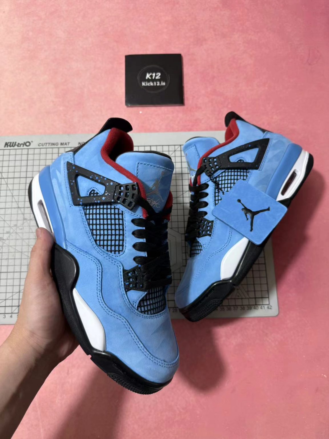 Full suede upper on Jordan 4 Travis Scott reps in University Blue