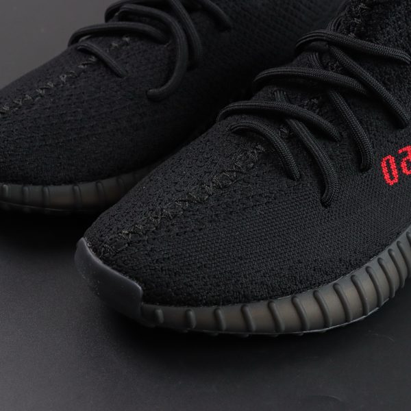 Toebox of Yeezy 350 Bred reps with black knit texture