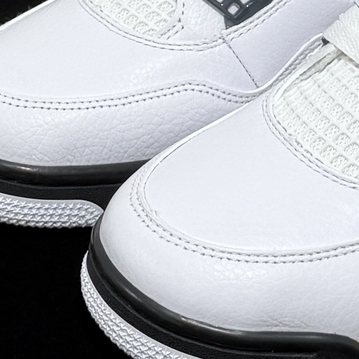 Close-up of toebox on Jordan 4 Rare Air Tour Yellow Reps
